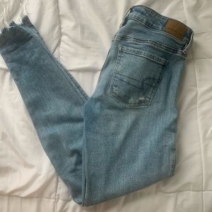 SOLD - American Eagle low rise medium wash skinny jeans size 2